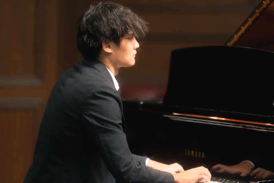 Kaine Zhu performing on stage
